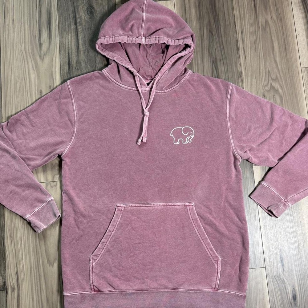 Ivory Ella pink hoodie featuring a cute white elephant graphic on the front